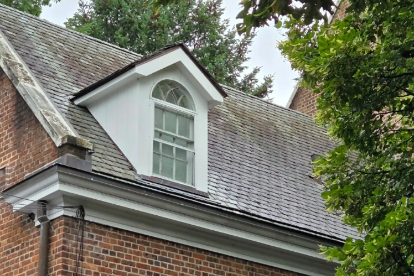 Clubhouse dormer, close up in Manhasset before slate cleaning
