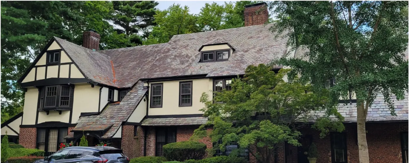 Tudor with multicolor slate in Garden City before slate cleaning