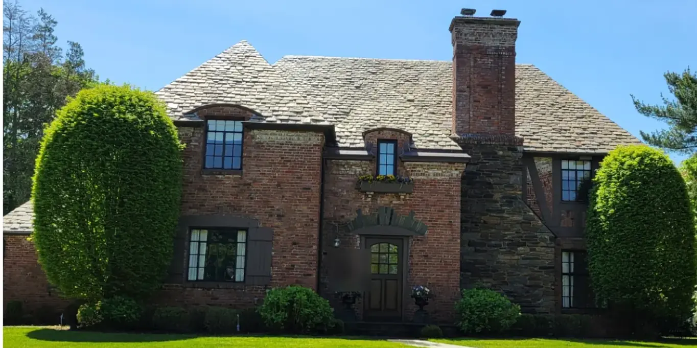 Tudor with thick, textured slate in Garden City after slate cleaning
