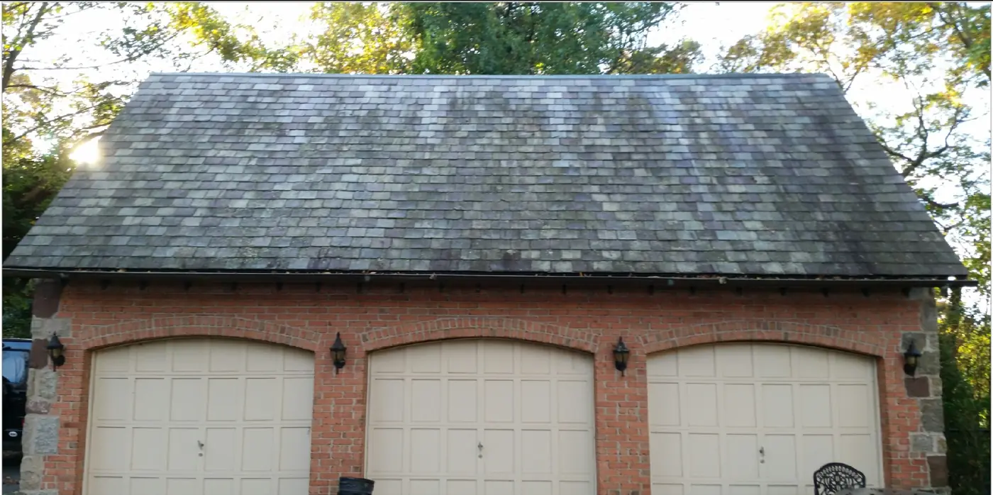 Detached garage in Huntington before slate cleaning