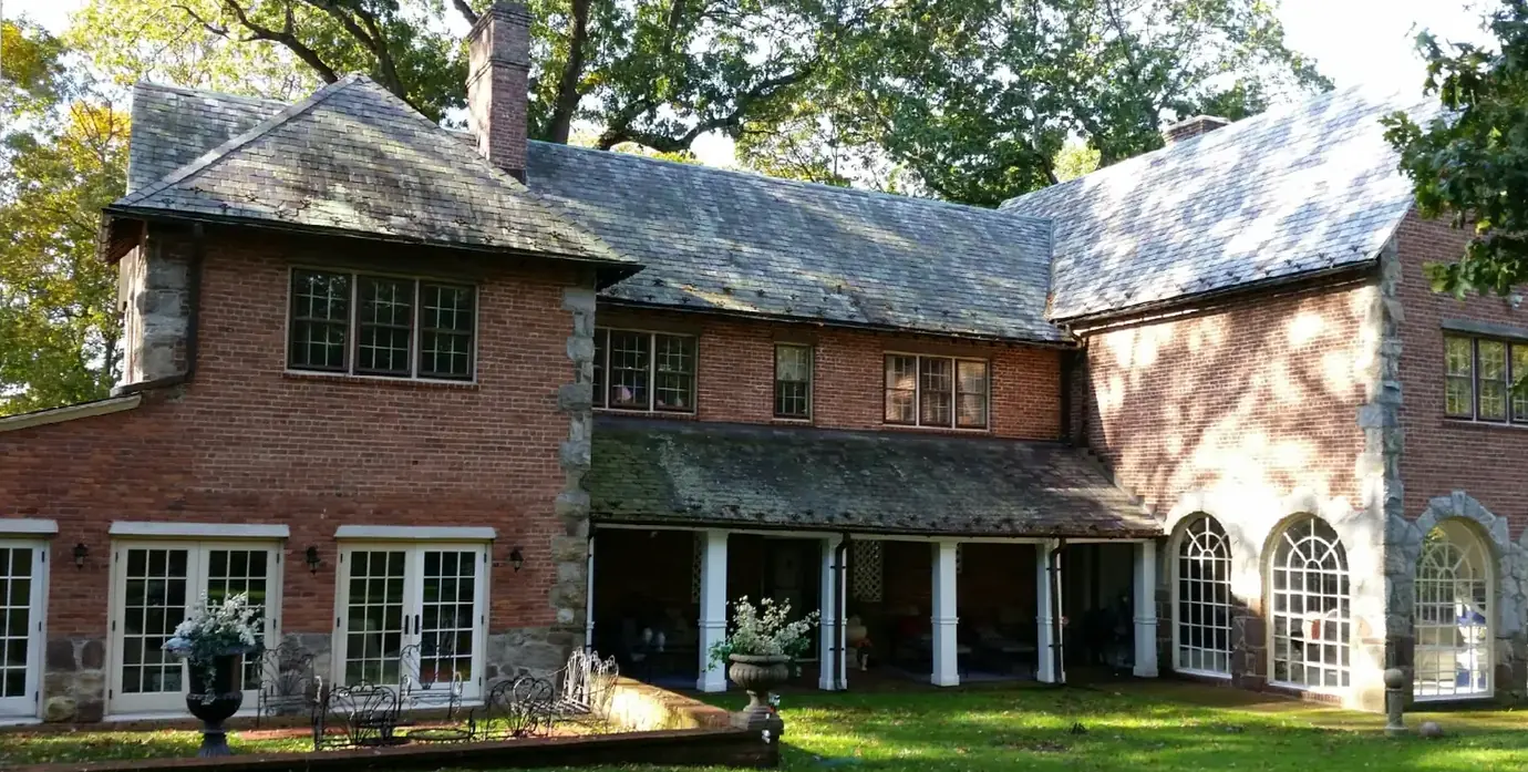 Large brick estate, rear in Huntington before slate cleaning