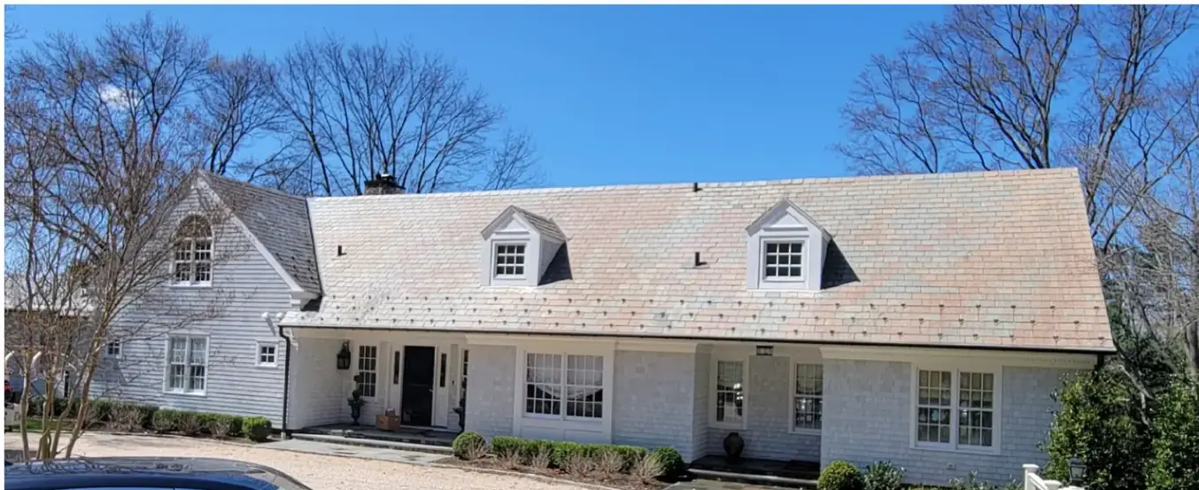 Shingle-style home with colorful slate in Mill Neck after slate cleaning