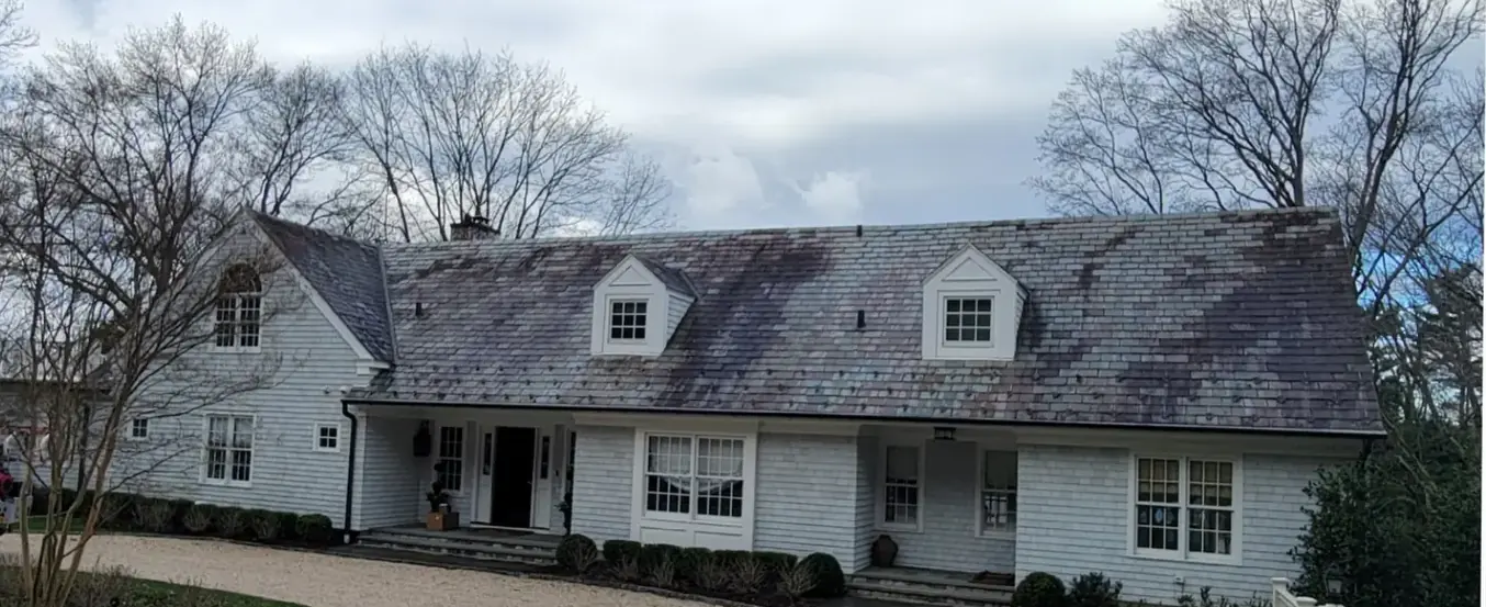 Shingle-style home with colorful slate in Mill Neck before slate cleaning