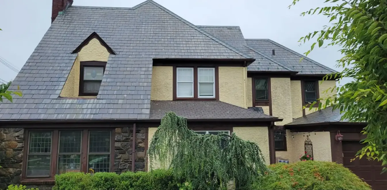 Stucco Tudor with stone and slate in Roslyn after slate cleaning