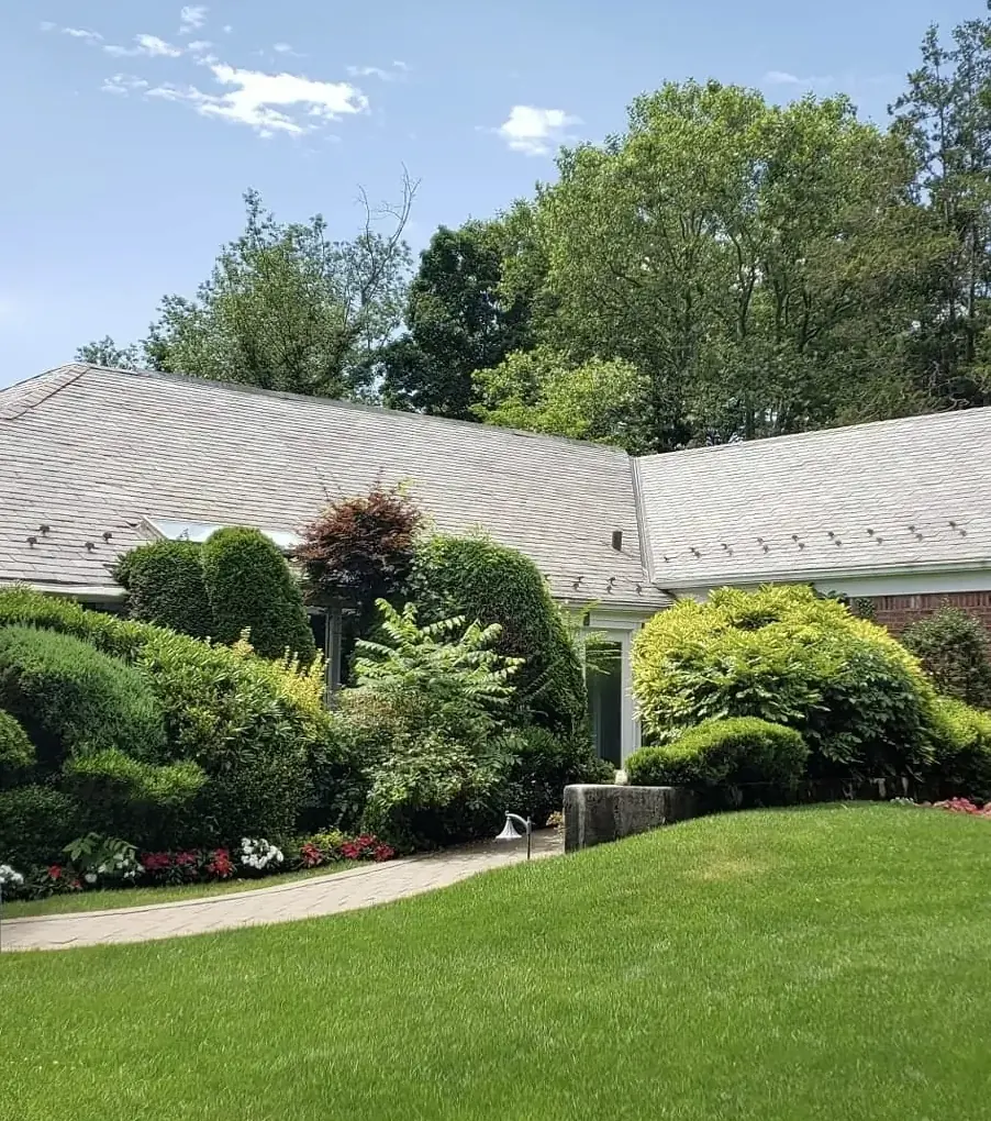 Brick ranch with snow guards in Sands Point after slate cleaning
